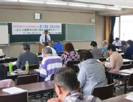 長野県の市町村国保の特徴と国保改善の課題について提案する湯浅事務局長　写真
